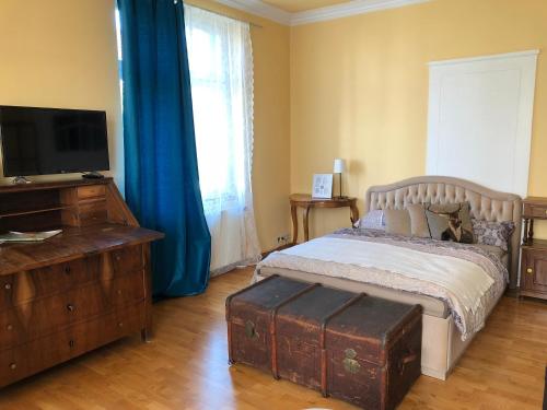 Een bed of bedden in een kamer bij Pension Villa Luise