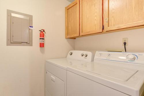 a white washer and dryer in a laundry room at Quelah Condo - Unit 11 in Sunriver