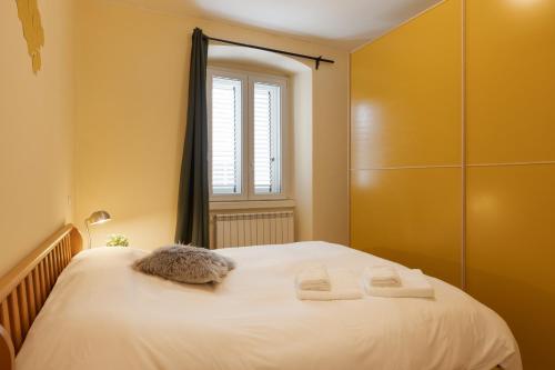Postel nebo postele na pokoji v ubytování Rifugio Joyce, comfort a Trieste con parcheggio
