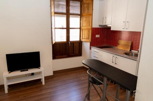 Una cocina o zona de cocina en Puerta Real Luxury Apartments Granada