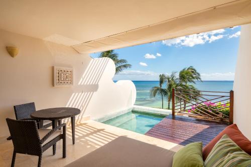 a villa with a view of the ocean at Grand Velas Riviera Maya - All Inclusive in Playa del Carmen