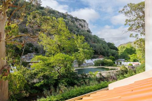 a view of a mountain from a house at Casas Du Rio in Maceira