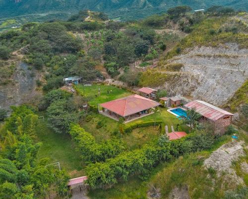 an aerial view of a house on a hill at Finca Valentina in Valladolid