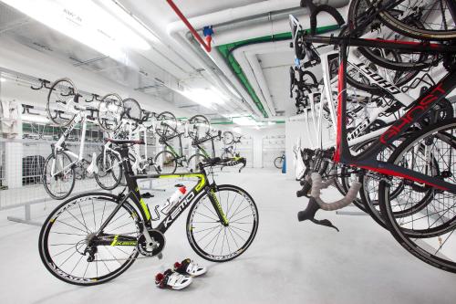 a bike is parked in a bike rack at JS Palma Stay - Adults Only in Can Pastilla