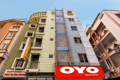 a building with an oo sign in front of it at OYO Sai Ram Residency in Bangalore