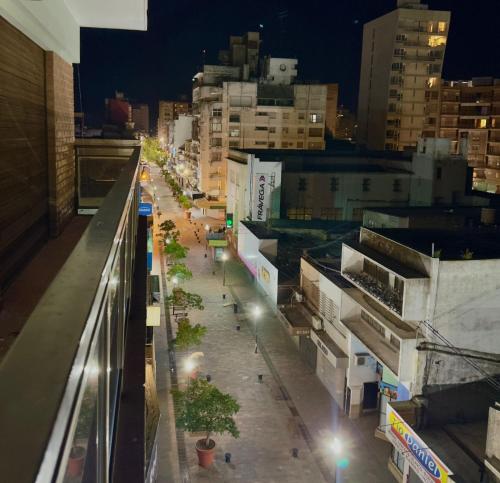a view of a city street at night at Depto cómodo, ubicación perfecta in Pergamino
