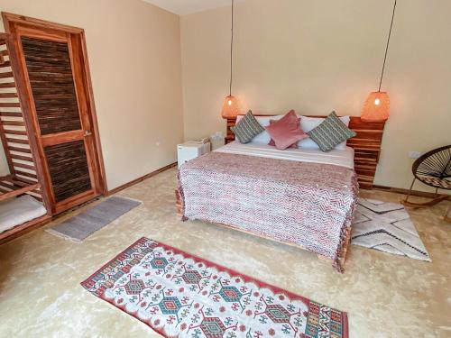 Katil atau katil-katil dalam bilik di Tay Beach Hotel Tayrona