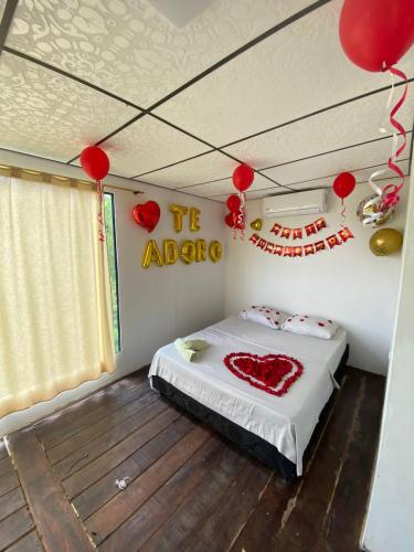 Ένα ή περισσότερα κρεβάτια σε δωμάτιο στο Glamping girardot- finca la perla