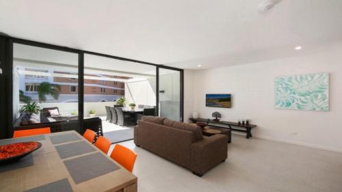 Un lugar para sentarse en The Harmony Suite Wifi , Short Walk To Beach Accom Holidays