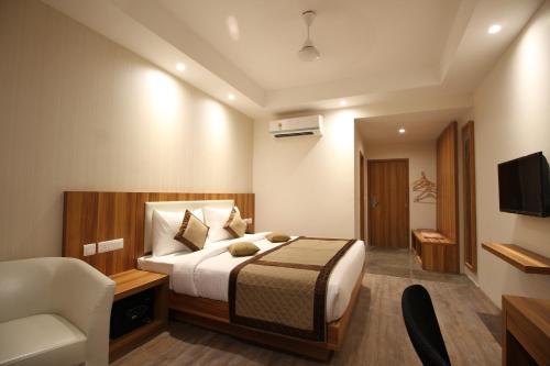 Krevet ili kreveti u jedinici u okviru objekta Hotel Le Roi Raipur at Raipur Railway Station