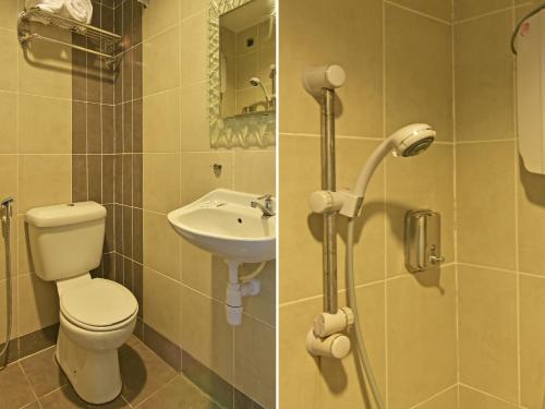 吉隆坡的住宿－Super OYO 90780 J Hotel Bukit Bintang，一间带卫生间和水槽的浴室