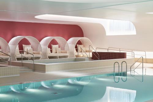 a rendering of a swimming pool in a hotel at Nine Tree Premier ROKAUS Hotel Seoul Yongsan in Seoul