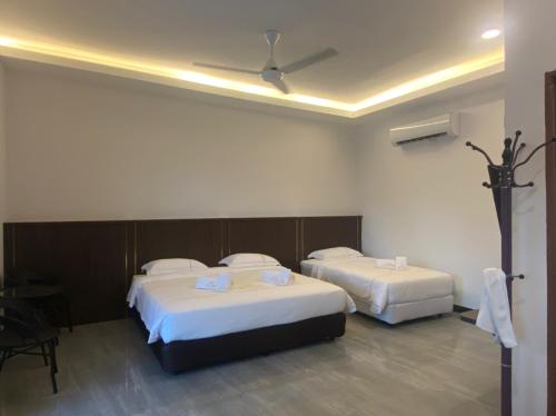 Ένα ή περισσότερα κρεβάτια σε δωμάτιο στο D View Holiday Homes