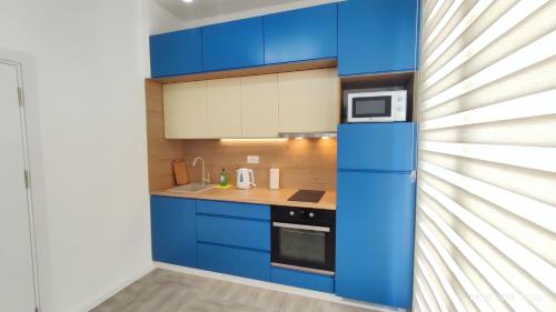 Η κουζίνα ή μικρή κουζίνα στο Apartments LORA Susanj