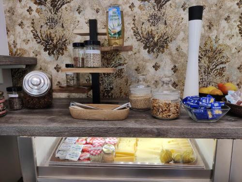 a refrigerator filled with lots of food on a counter at Weingut Lieschnegg in Leutschach