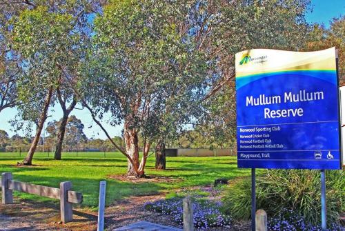 a sign in the middle of a park at Pet-Friendly Retreat 2BR Ringwood Prime location in Ringwood