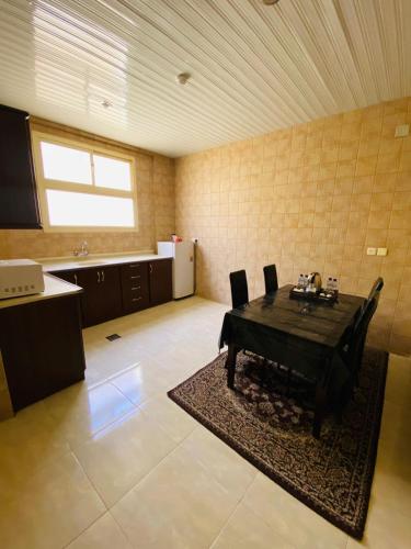 Un lugar para sentarse en راحة للأجنحة الفندقية Raha hotel suites