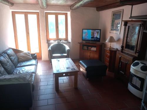 TV a/nebo společenská místnost v ubytování Casa Tita