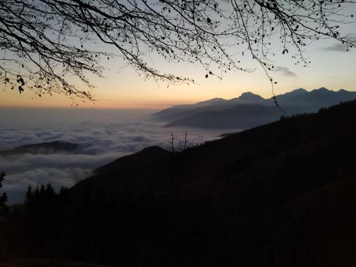 a view of a mountain with clouds in the sky at Locanda Bocchetto Sessera in Bielmonte