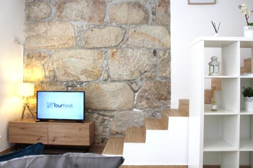 TV a/nebo společenská místnost v ubytování A Casa Pequena in Porto