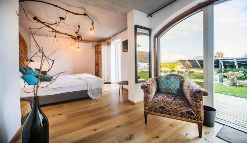 Postel nebo postele na pokoji v ubytování Hotel Pok Garni