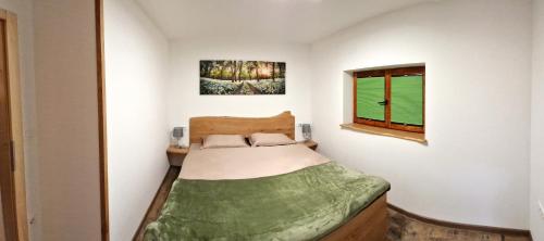 Кровать или кровати в номере Bled Straza House