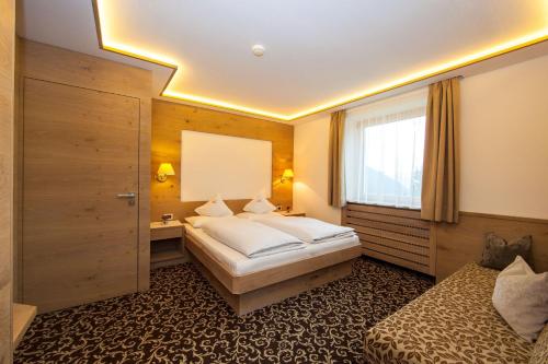 Katil atau katil-katil dalam bilik di Apartments Aghel ***S