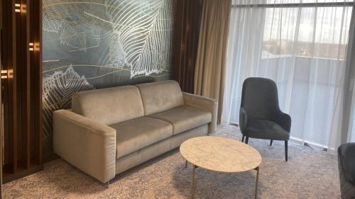 Χώρος καθιστικού στο Tisia Hotel & Spa