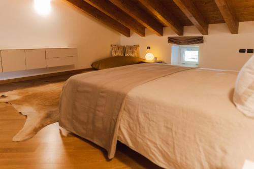 A bed or beds in a room at Casa Celeste