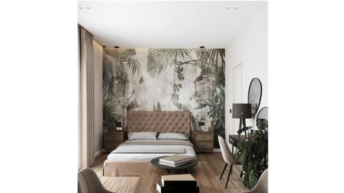a bedroom with a bed and a wall mural at Cristina Apartments in Gaios