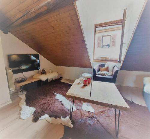 a living room with a floor that has been ripped up at Chalet charm in the heart of the old town - 40m2 in Annecy