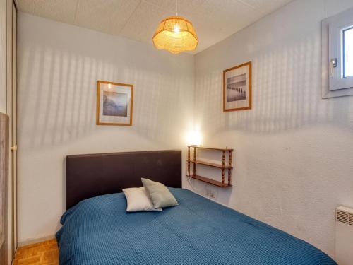 Ένα ή περισσότερα κρεβάτια σε δωμάτιο στο Apartment Ortal Océan-2 by Interhome