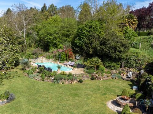 an aerial view of a garden with a swimming pool at Holiday Home Moulin De Mois by Interhome in Joussé
