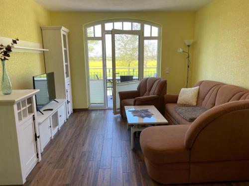 TV a/nebo společenská místnost v ubytování Apartment Tulpe by Interhome
