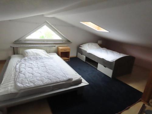 Katil atau katil-katil dalam bilik di Ferienhaus mit Kamin in Sassnitz bis 6 Personen
