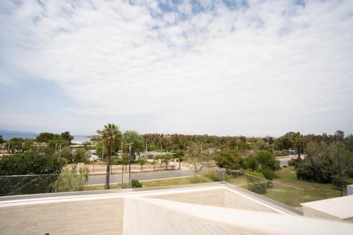 a view from the balcony of a house at Parthenis Riviera Hotel in Athens