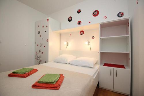 מיטה או מיטות בחדר ב-Apartmani Zec
