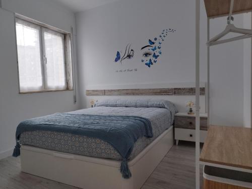 Ένα ή περισσότερα κρεβάτια σε δωμάτιο στο BALCON DEL EO