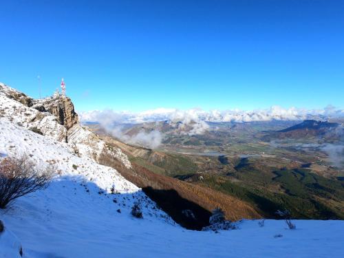 a view from the top of a mountain in the snow at Fifi Moulin in Serres