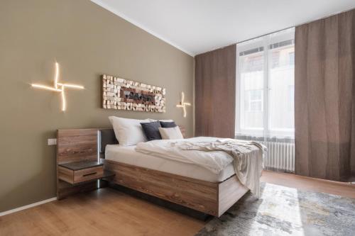 Postel nebo postele na pokoji v ubytování Deluxe apartment in Old Town by Prague Days