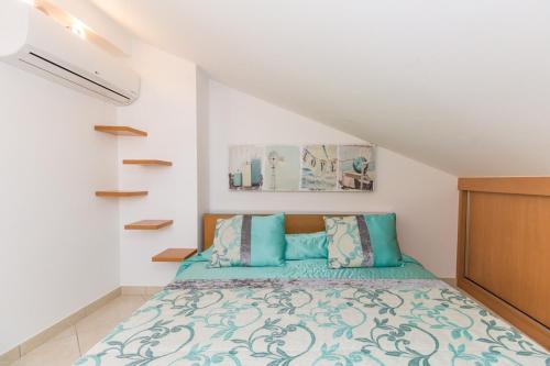 Ένα ή περισσότερα κρεβάτια σε δωμάτιο στο Apt - ROCHA 5T3 By ALGARVEMANTA