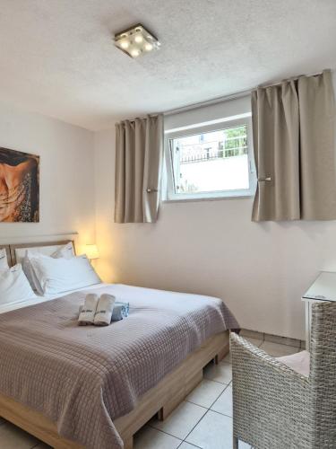 Ένα ή περισσότερα κρεβάτια σε δωμάτιο στο Apartments Silva with a view of sea