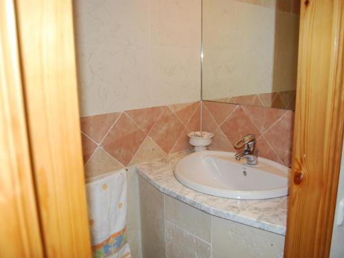 a bathroom with a sink and a counter at Ibiza in Begur