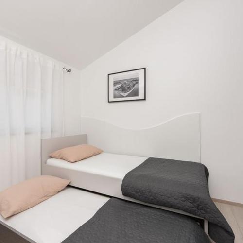 Кровать или кровати в номере Private House For You Zadar