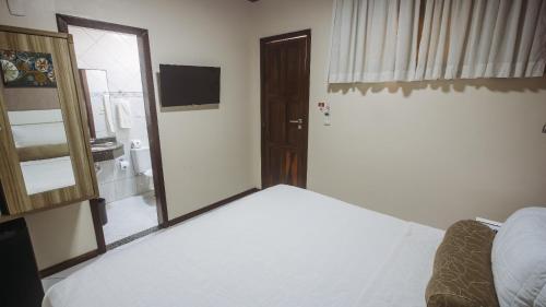 Katil atau katil-katil dalam bilik di Pousada Pérola Do Morro