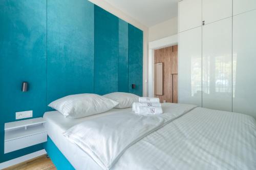 Katil atau katil-katil dalam bilik di Let's Sea - City Apartments