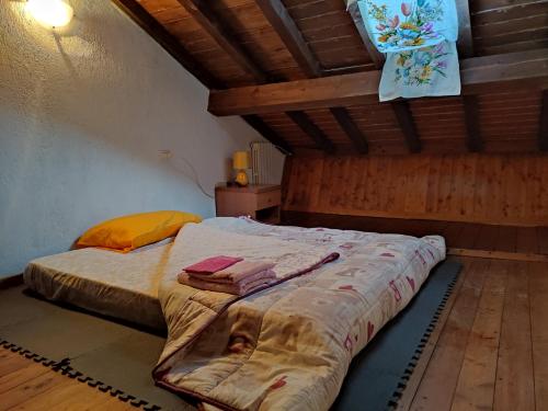 A bed or beds in a room at Il ristoro del viandante
