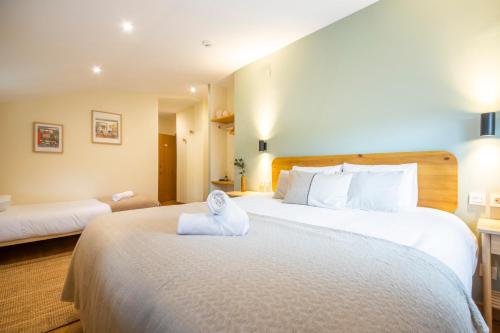 Katil atau katil-katil dalam bilik di Hotel Donosti