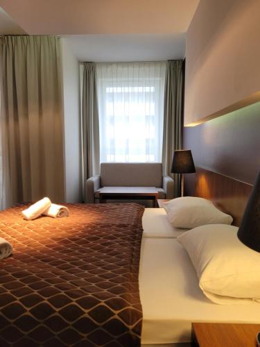 Ένα ή περισσότερα κρεβάτια σε δωμάτιο στο Diva Resort