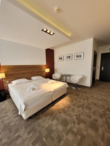 Ένα ή περισσότερα κρεβάτια σε δωμάτιο στο Diva Resort